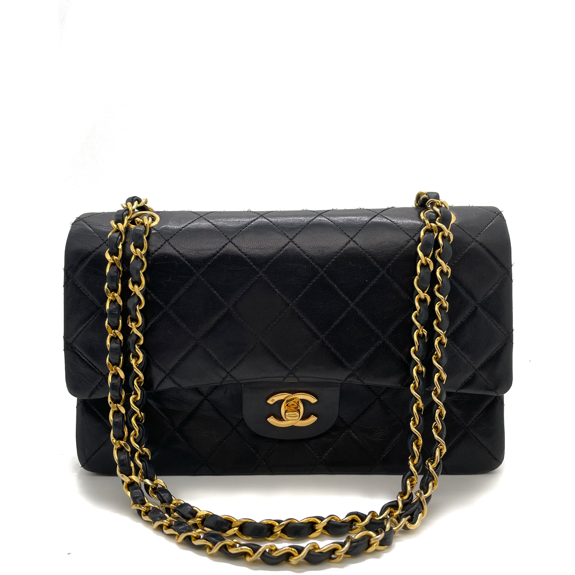 Black Vintage Round Flap Bag in Quilted Leather with Gold Hardware